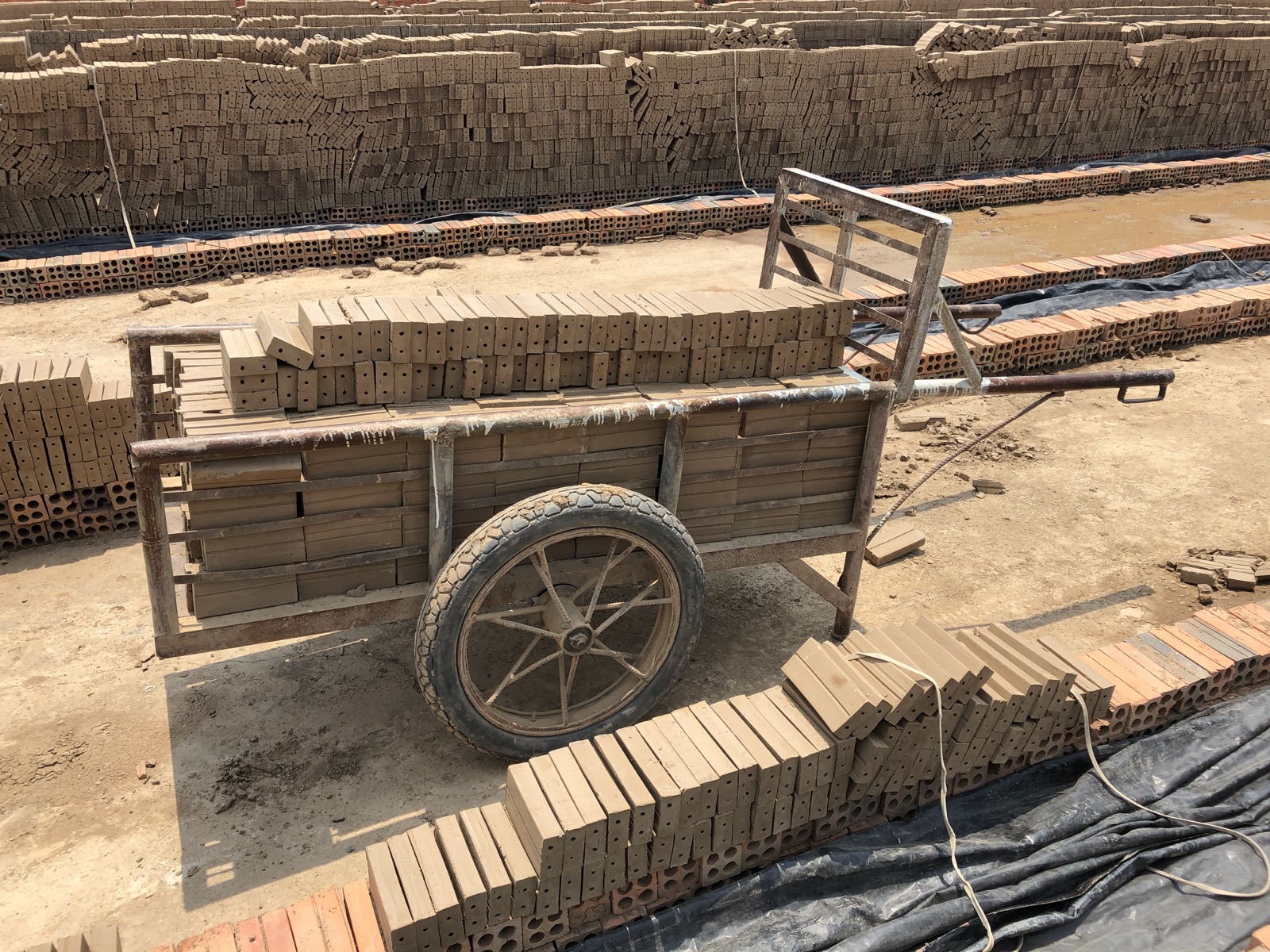 Bricks stacked in a cart at a factory in Cambodia's Kandal province in March 2019.
