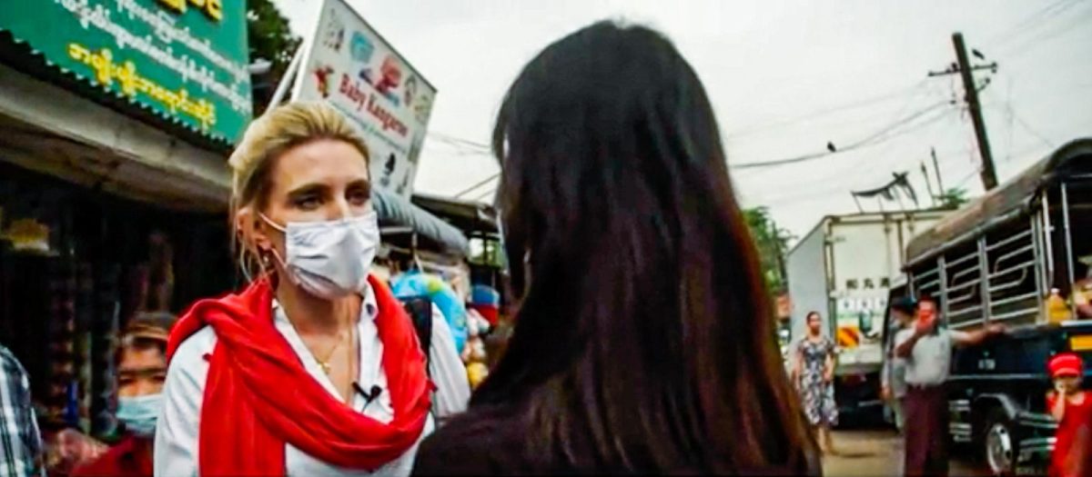 A screenshot of a CNN video report with journalist Clarissa Ward interviewing a Myanmar person.