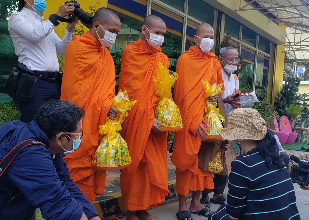Sitanun Satsaksit receives a blessing from monks near the Mekong Gardens condominiums in Phnom Penh’s Chroy Changva District on 9 December 2020.