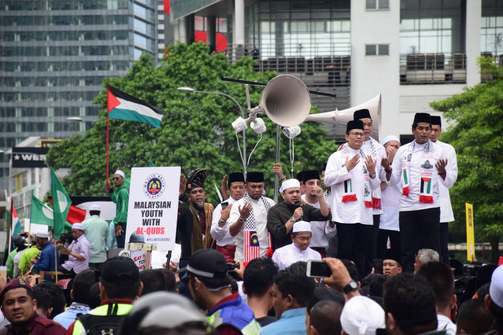 Demonstrators, including Khairy Jamaluddin, who is now Minister of Science, Technology and Innovation, gather in Kuala Lumpur on 8 December 2017 to protest the closure of Al-Aqsa Mosque in Jerusalem.